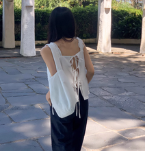 画像をギャラリービューアに読み込む, おしゃれなあの子が着ていたバックリボンビスチェトップス_N2672