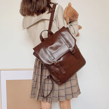 画像をギャラリービューアに読み込む, 朝の路面電車で膝に抱えていたリュック_K0042