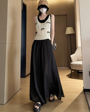 画像をギャラリービューアに読み込む, カフェテラスで見たパリの朝陽に映える優雅なスカート_K0060