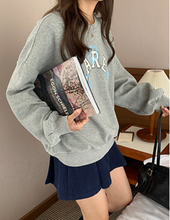 画像をギャラリービューアに読み込む, 無邪気な笑顔が可愛い女の子のワッフルスウェット_N1544