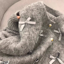 画像をギャラリービューアに読み込む, 物語の途中で主人公が選んだリボンニットカーディガン_K0268