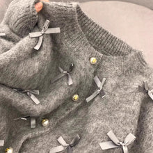 画像をギャラリービューアに読み込む, 物語の途中で主人公が選んだリボンニットカーディガン_K0268