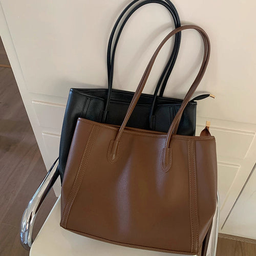 書類と夢を一緒に詰めて出勤する女の子のクラシカルバッグ_K0210