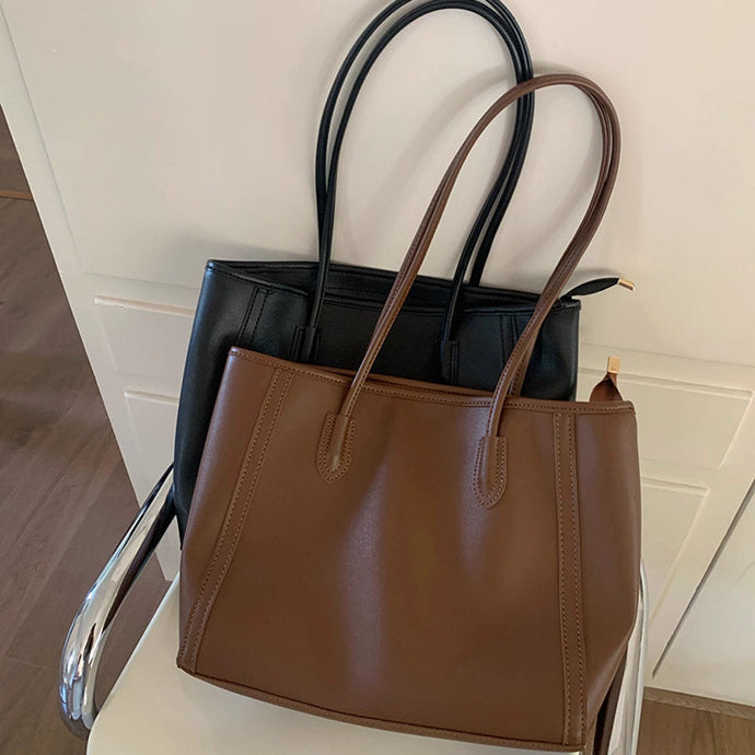 書類と夢を一緒に詰めて出勤する女の子のクラシカルバッグ_K0210